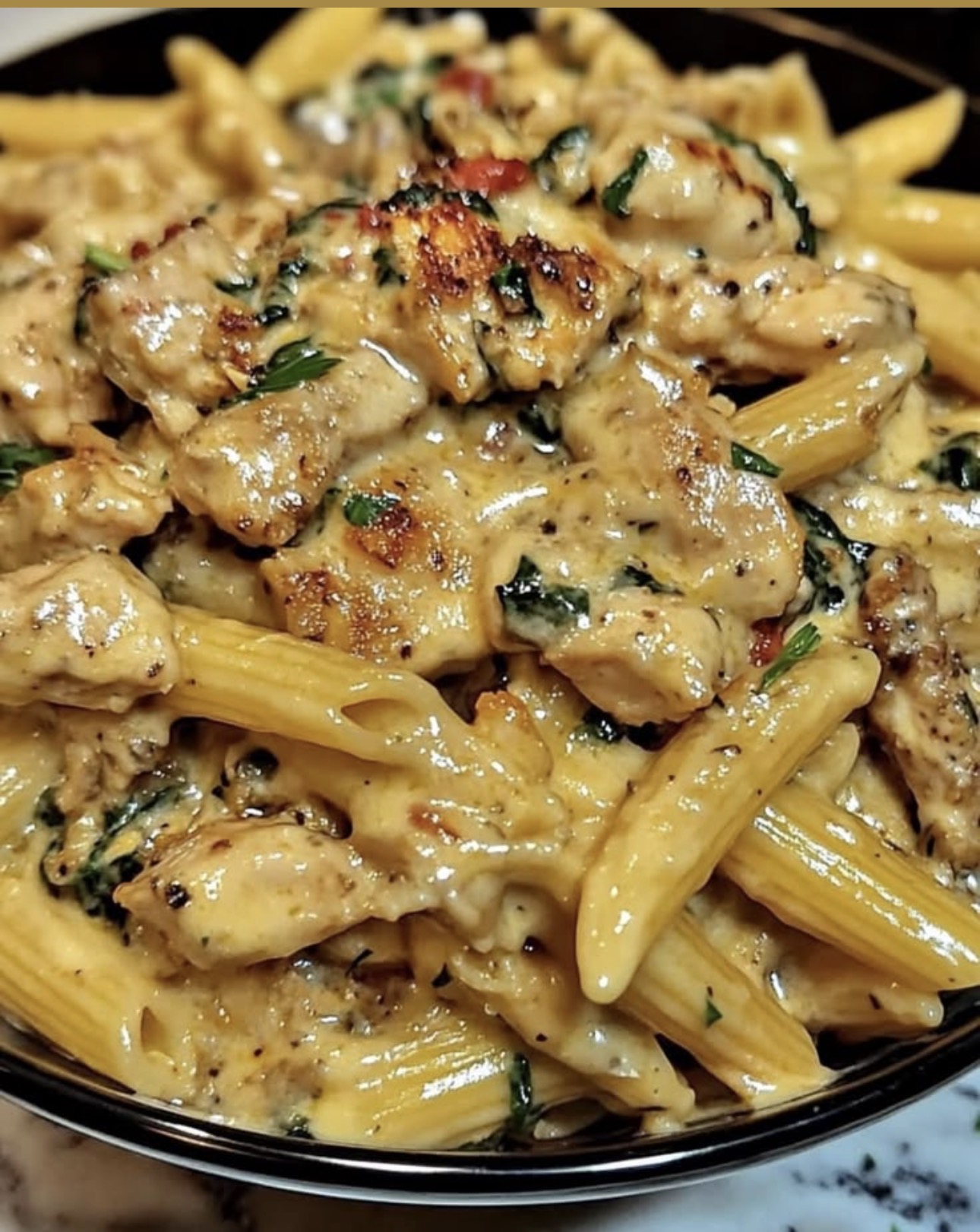 Cremeria signature chicken Alfredo pasta